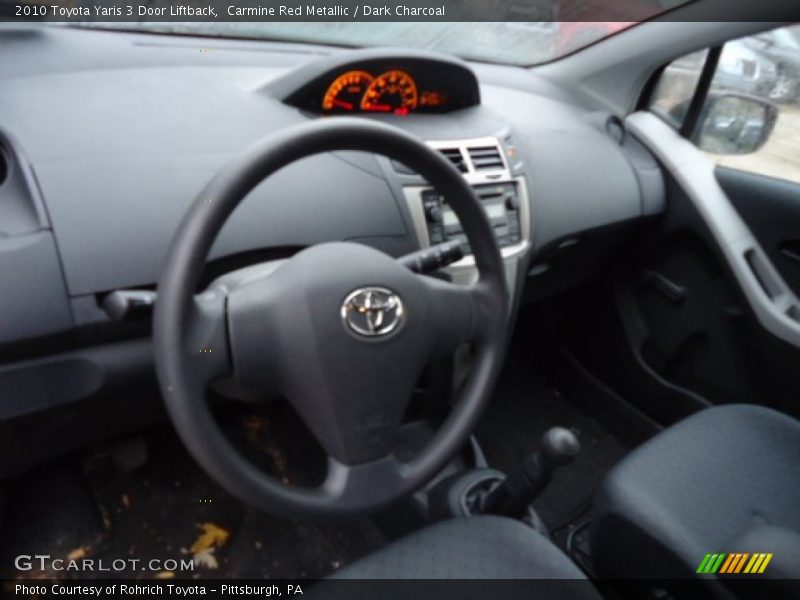 Carmine Red Metallic / Dark Charcoal 2010 Toyota Yaris 3 Door Liftback