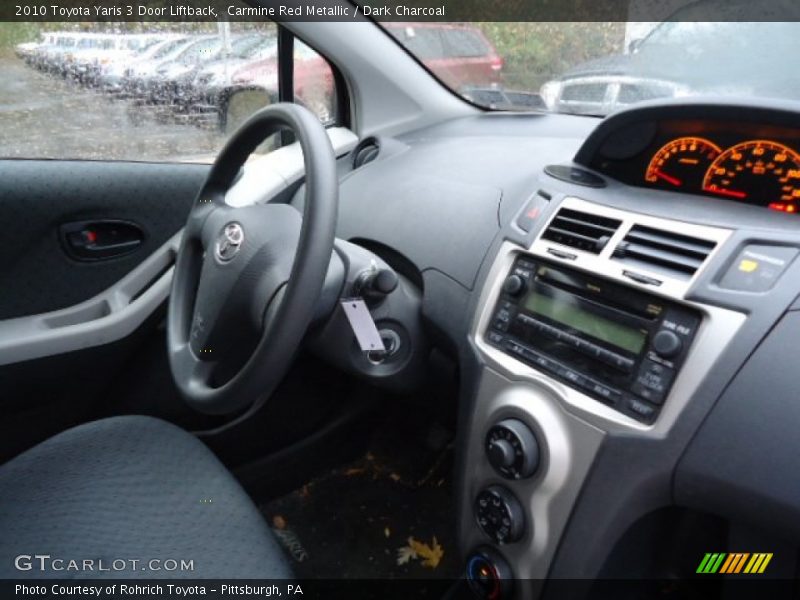 Carmine Red Metallic / Dark Charcoal 2010 Toyota Yaris 3 Door Liftback