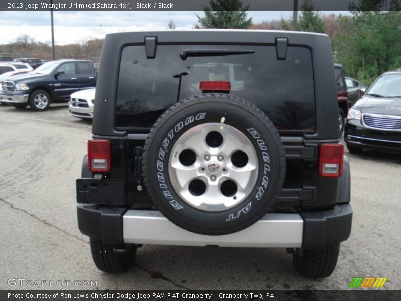 Black / Black 2013 Jeep Wrangler Unlimited Sahara 4x4