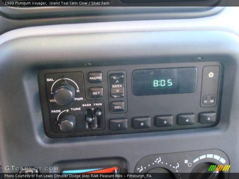 Island Teal Satin Glow / Silver Fern 1999 Plymouth Voyager