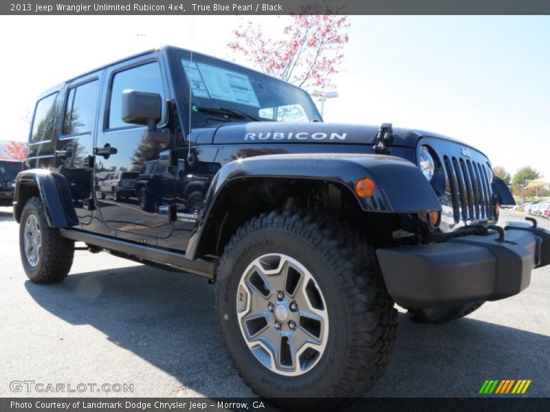 True Blue Pearl / Black 2013 Jeep Wrangler Unlimited Rubicon 4x4
