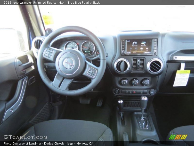 True Blue Pearl / Black 2013 Jeep Wrangler Unlimited Rubicon 4x4