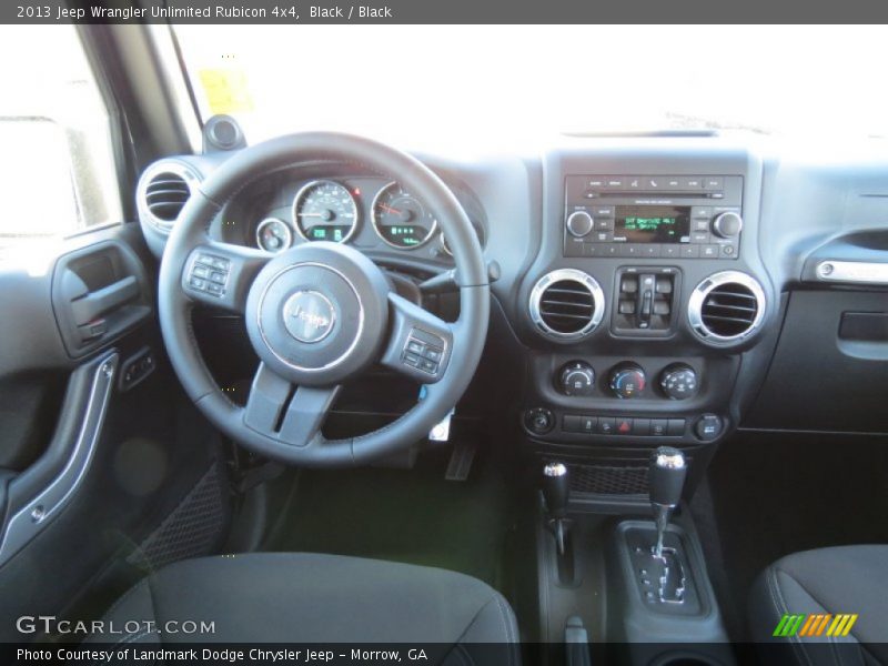 Black / Black 2013 Jeep Wrangler Unlimited Rubicon 4x4