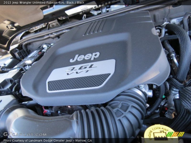 Black / Black 2013 Jeep Wrangler Unlimited Rubicon 4x4