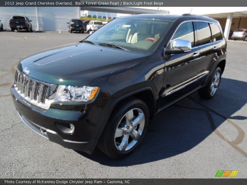 Black Forest Green Pearl / Black/Light Frost Beige 2013 Jeep Grand Cherokee Overland