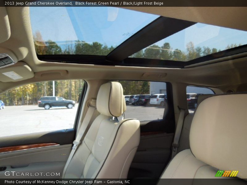Black Forest Green Pearl / Black/Light Frost Beige 2013 Jeep Grand Cherokee Overland