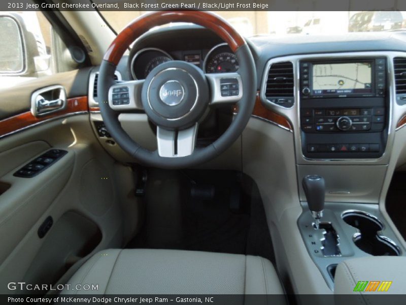 Black Forest Green Pearl / Black/Light Frost Beige 2013 Jeep Grand Cherokee Overland