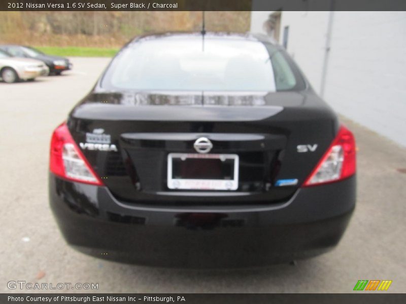 Super Black / Charcoal 2012 Nissan Versa 1.6 SV Sedan