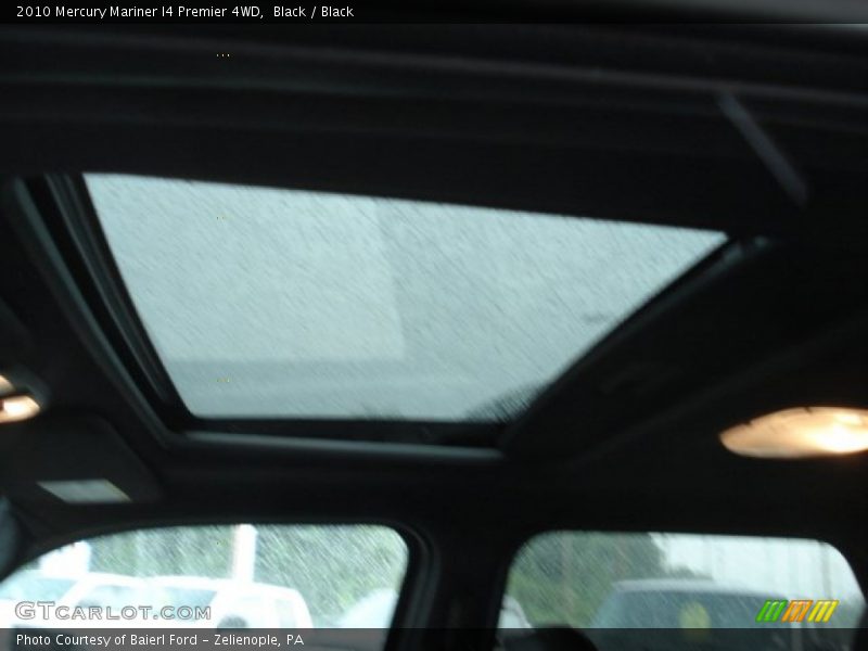 Black / Black 2010 Mercury Mariner I4 Premier 4WD