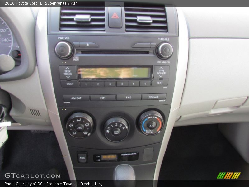 Super White / Ash 2010 Toyota Corolla