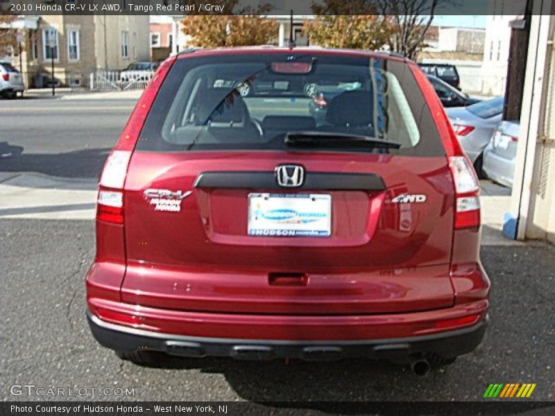 Tango Red Pearl / Gray 2010 Honda CR-V LX AWD