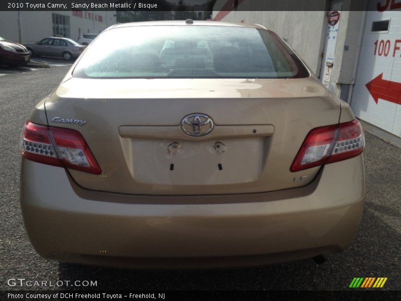 Sandy Beach Metallic / Bisque 2010 Toyota Camry