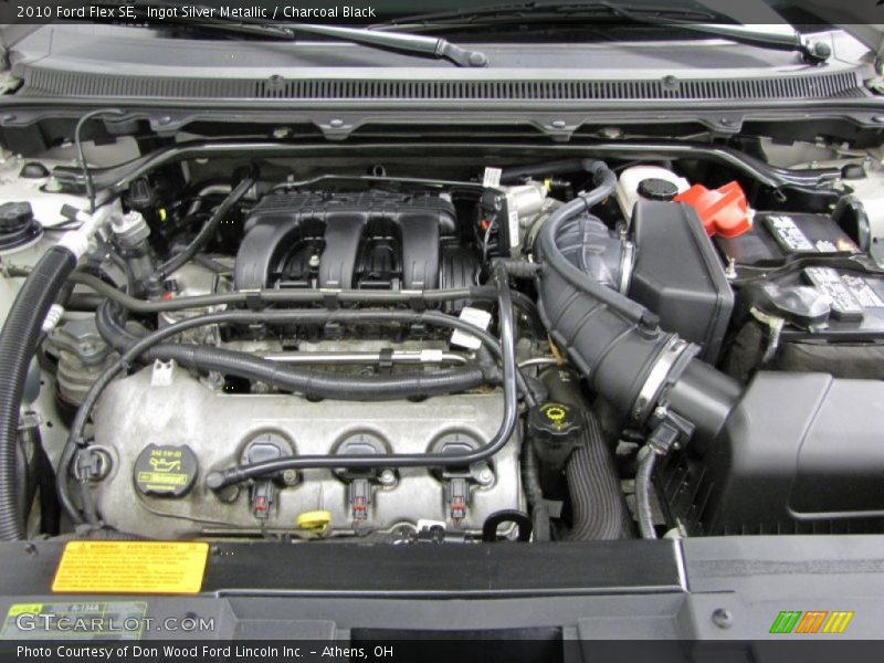 Ingot Silver Metallic / Charcoal Black 2010 Ford Flex SE