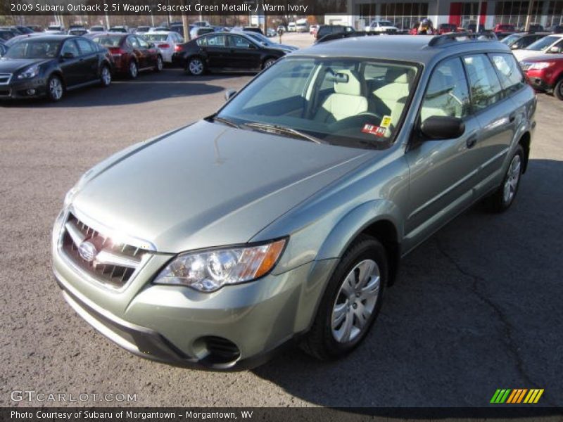 Seacrest Green Metallic / Warm Ivory 2009 Subaru Outback 2.5i Wagon