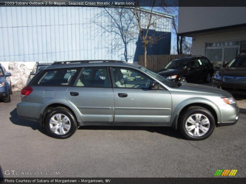 Seacrest Green Metallic / Warm Ivory 2009 Subaru Outback 2.5i Wagon