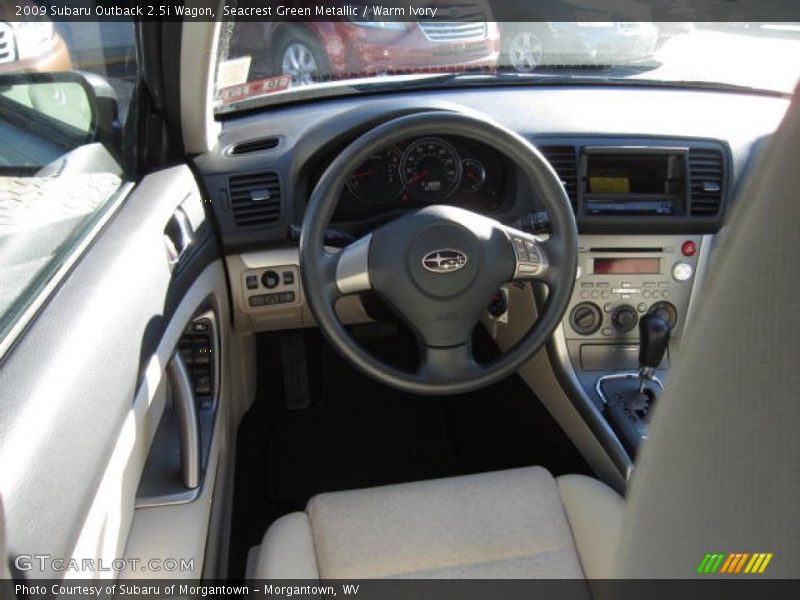 Seacrest Green Metallic / Warm Ivory 2009 Subaru Outback 2.5i Wagon