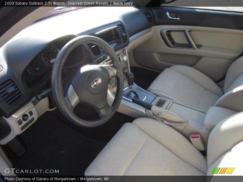 Seacrest Green Metallic / Warm Ivory 2009 Subaru Outback 2.5i Wagon