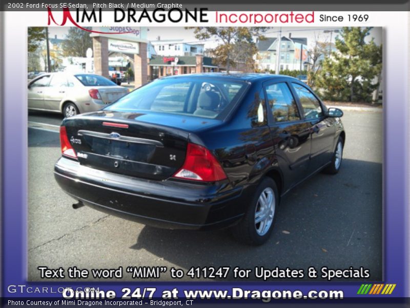 Pitch Black / Medium Graphite 2002 Ford Focus SE Sedan