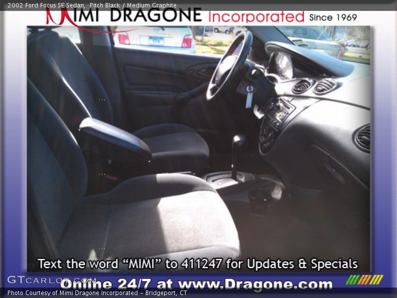 Pitch Black / Medium Graphite 2002 Ford Focus SE Sedan