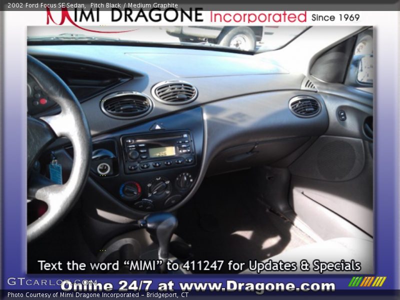 Pitch Black / Medium Graphite 2002 Ford Focus SE Sedan