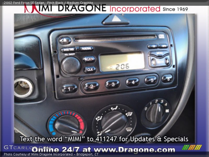 Pitch Black / Medium Graphite 2002 Ford Focus SE Sedan