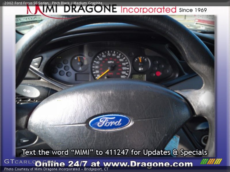 Pitch Black / Medium Graphite 2002 Ford Focus SE Sedan