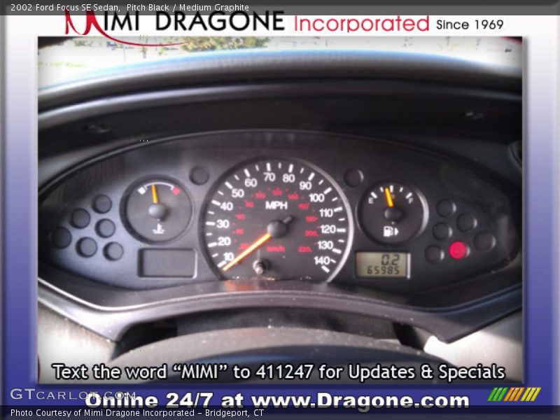 Pitch Black / Medium Graphite 2002 Ford Focus SE Sedan