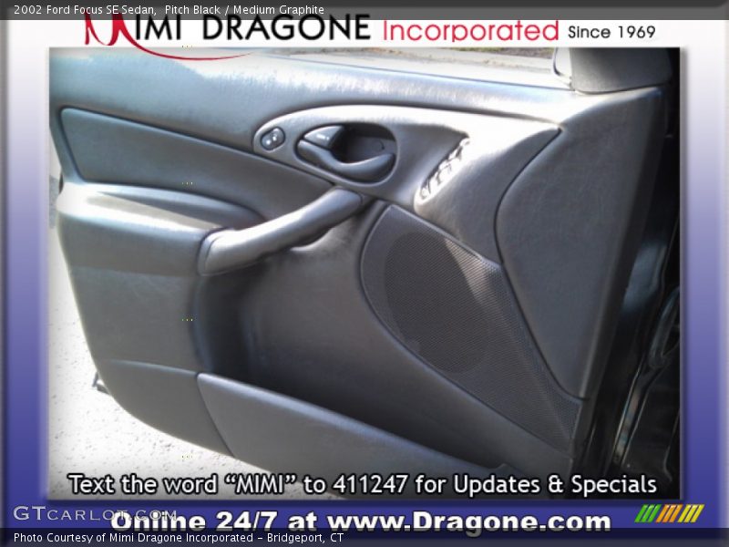 Pitch Black / Medium Graphite 2002 Ford Focus SE Sedan