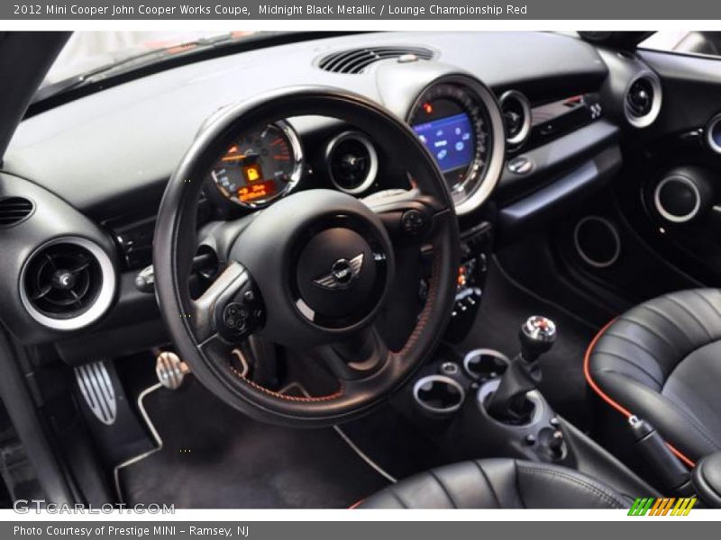  2012 Cooper John Cooper Works Coupe Lounge Championship Red Interior