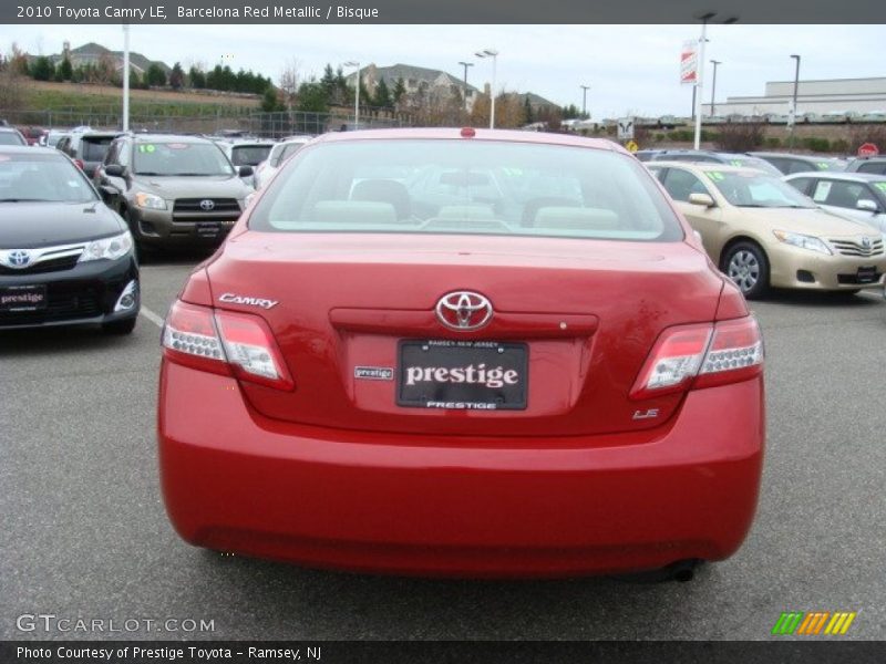 Barcelona Red Metallic / Bisque 2010 Toyota Camry LE