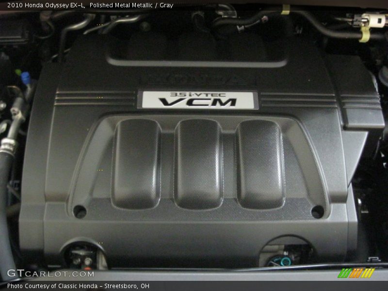 Polished Metal Metallic / Gray 2010 Honda Odyssey EX-L