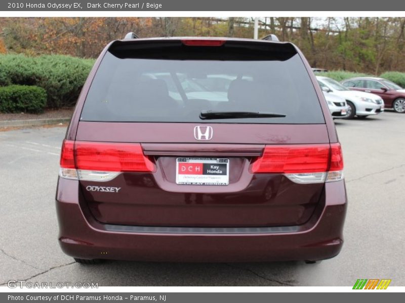 Dark Cherry Pearl / Beige 2010 Honda Odyssey EX