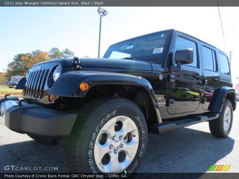 Black / Black 2013 Jeep Wrangler Unlimited Sahara 4x4