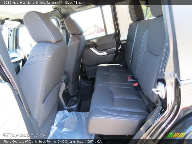 Black / Black 2013 Jeep Wrangler Unlimited Sahara 4x4