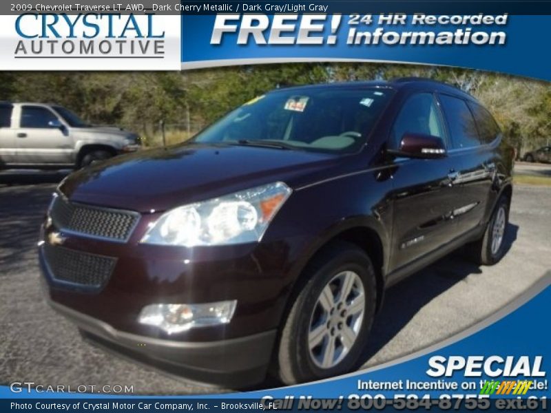 Dark Cherry Metallic / Dark Gray/Light Gray 2009 Chevrolet Traverse LT AWD