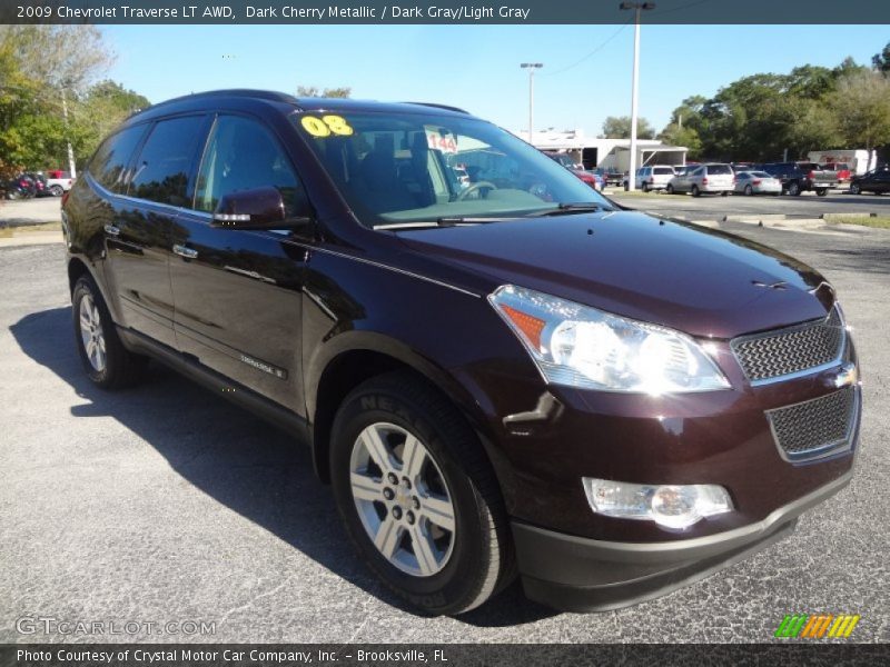 Dark Cherry Metallic / Dark Gray/Light Gray 2009 Chevrolet Traverse LT AWD