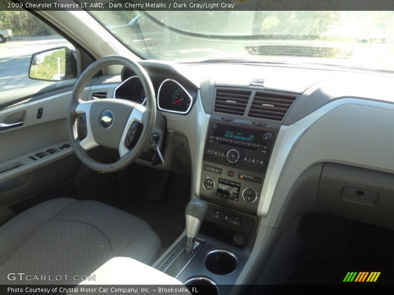 Dark Cherry Metallic / Dark Gray/Light Gray 2009 Chevrolet Traverse LT AWD