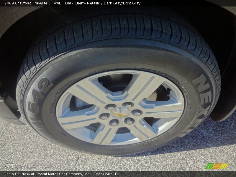 Dark Cherry Metallic / Dark Gray/Light Gray 2009 Chevrolet Traverse LT AWD