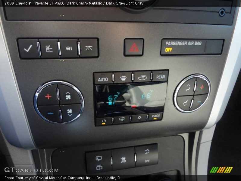 Dark Cherry Metallic / Dark Gray/Light Gray 2009 Chevrolet Traverse LT AWD