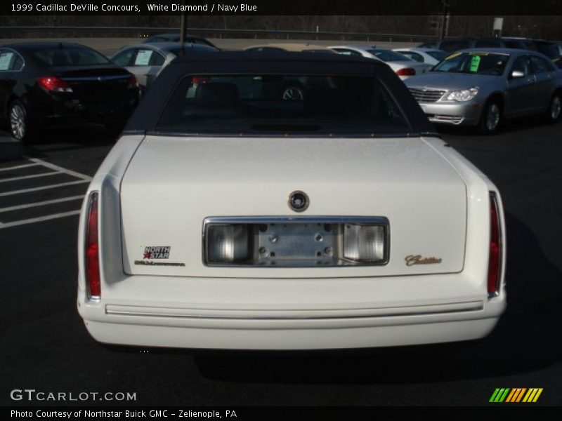 White Diamond / Navy Blue 1999 Cadillac DeVille Concours