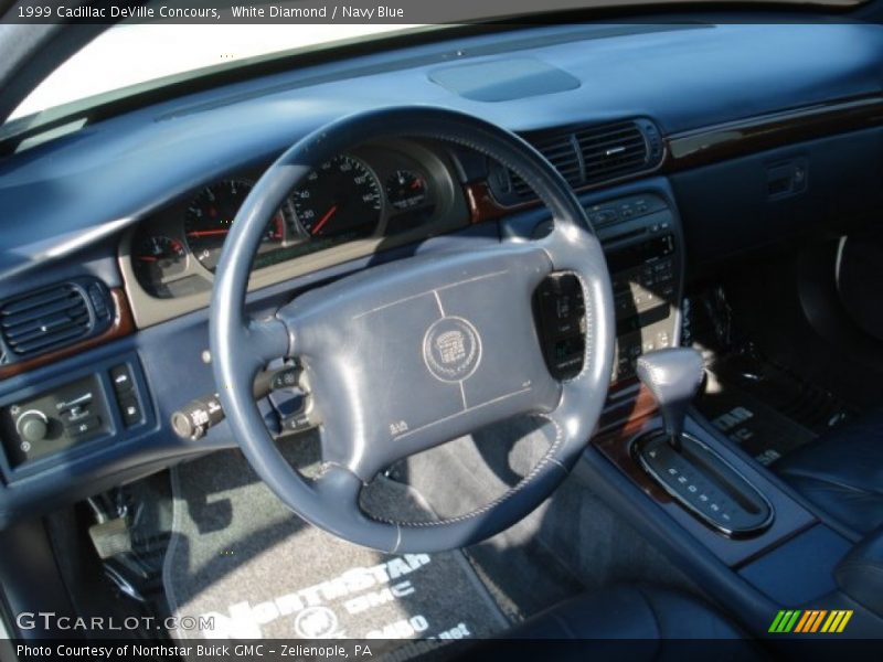 White Diamond / Navy Blue 1999 Cadillac DeVille Concours