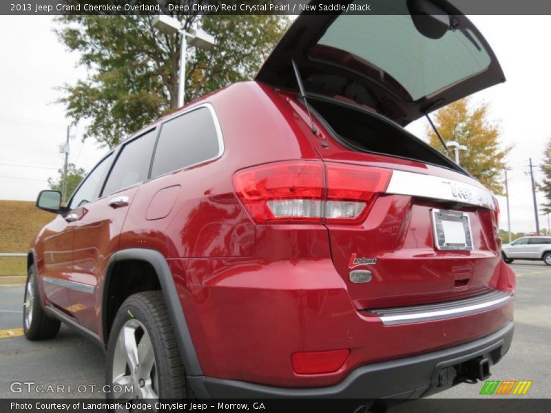 Deep Cherry Red Crystal Pearl / New Saddle/Black 2013 Jeep Grand Cherokee Overland