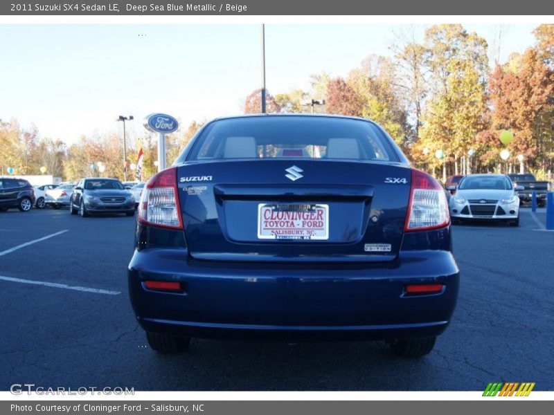 Deep Sea Blue Metallic / Beige 2011 Suzuki SX4 Sedan LE