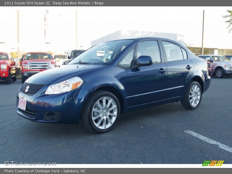 Front 3/4 View of 2011 SX4 Sedan LE