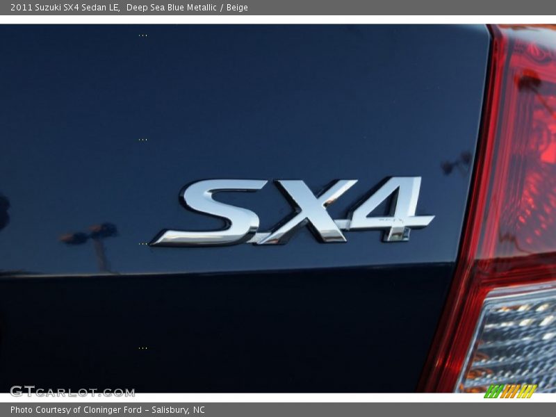  2011 SX4 Sedan LE Logo