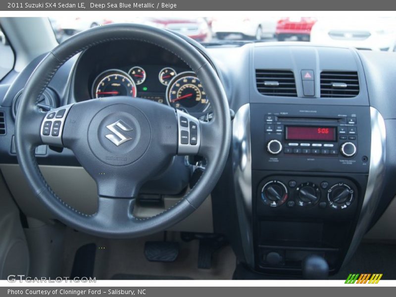 Dashboard of 2011 SX4 Sedan LE