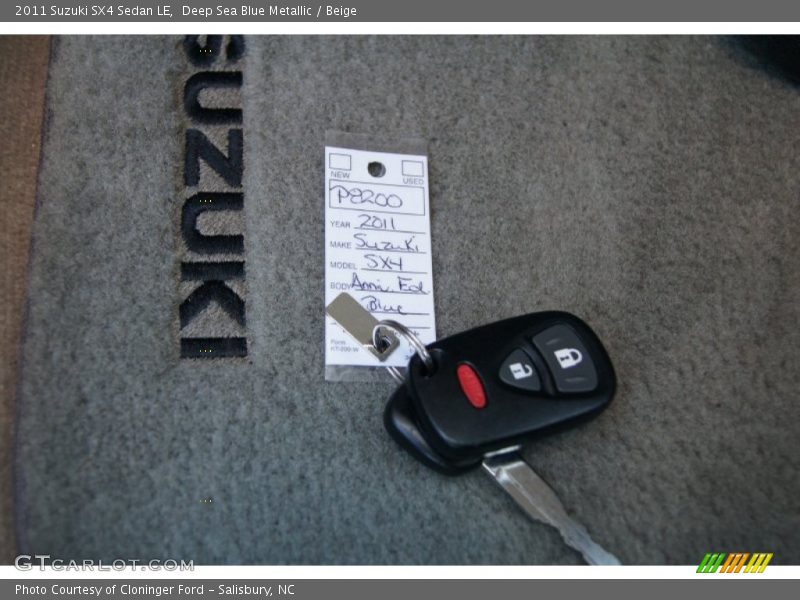 Deep Sea Blue Metallic / Beige 2011 Suzuki SX4 Sedan LE