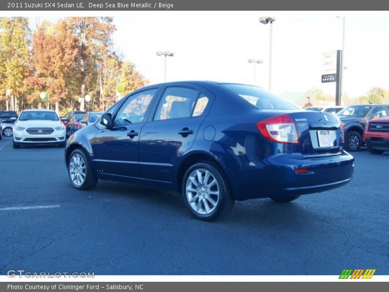 Deep Sea Blue Metallic / Beige 2011 Suzuki SX4 Sedan LE