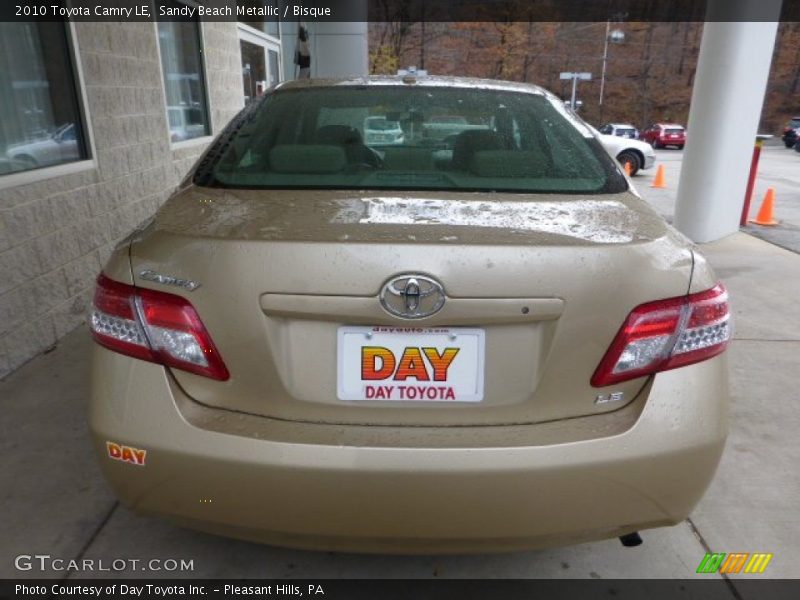 Sandy Beach Metallic / Bisque 2010 Toyota Camry LE