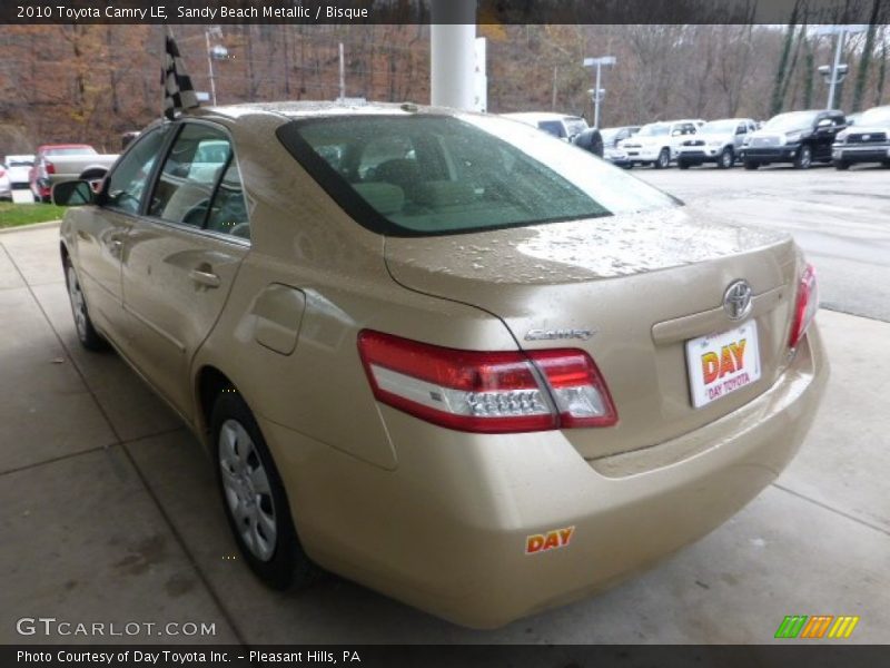 Sandy Beach Metallic / Bisque 2010 Toyota Camry LE
